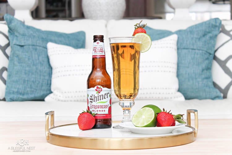 This is such a delicious beer cocktail recipe! Love the mix of strawberries and lime. See more on https://ablisfulnest.com/ #ad #totalwine #cocktailrecipe