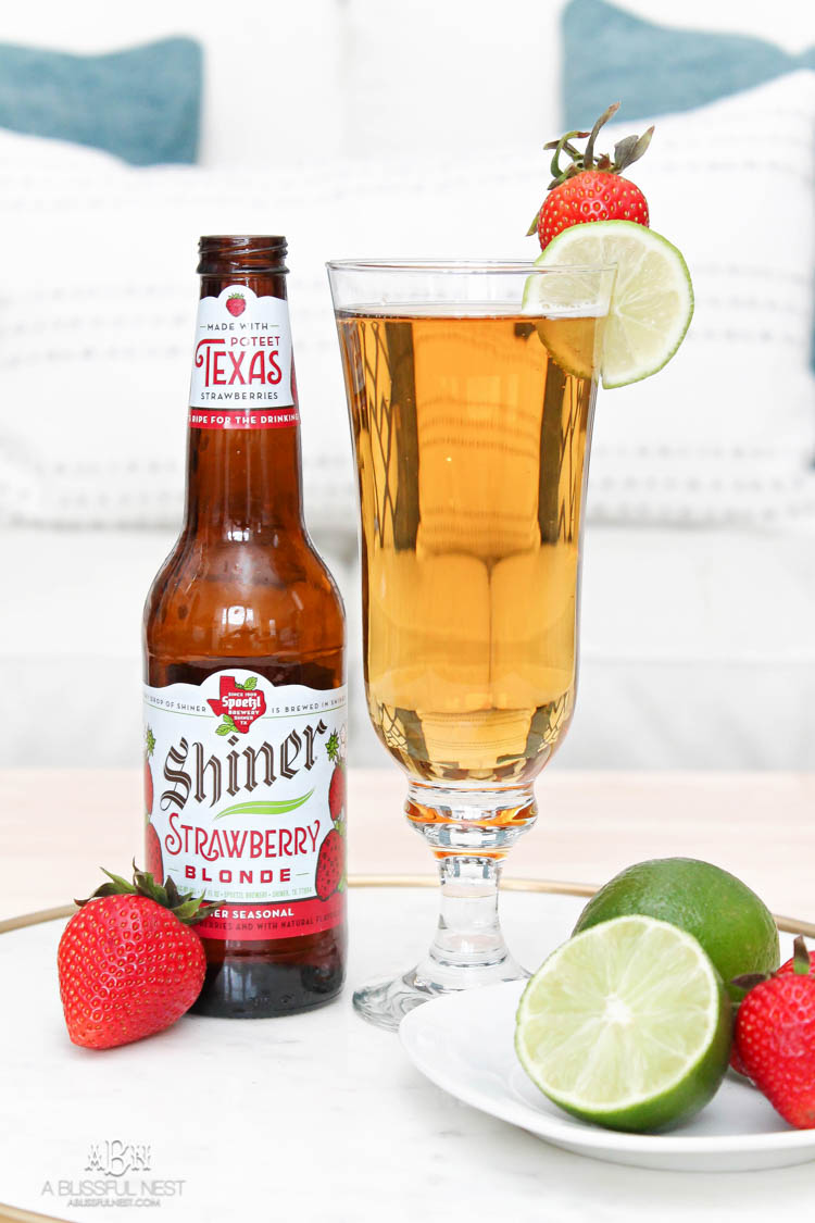 This is such a delicious beer cocktail recipe! Love the mix of strawberries and lime. See more on https://ablisfulnest.com/ #ad #totalwine #cocktailrecipe