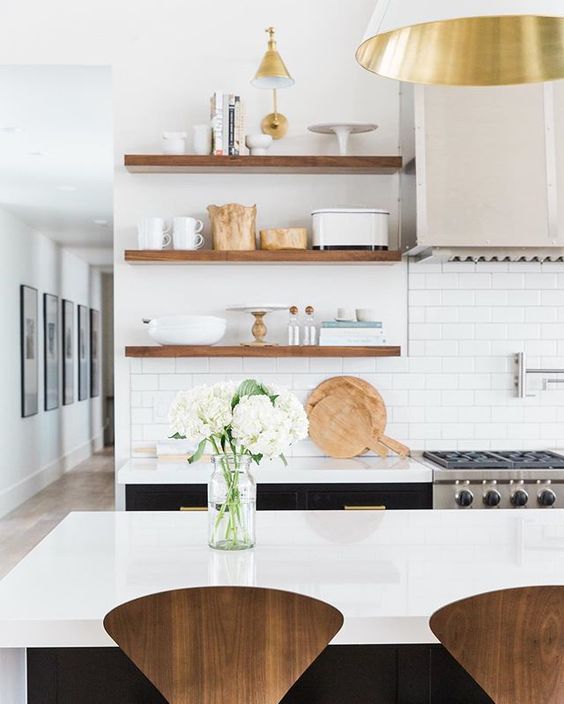 There are many ways and simple ideas to add warmth to your all white kitchen. Visit https://ablisfulnest.com/ to find out how! #interiors #kitchens #designertips