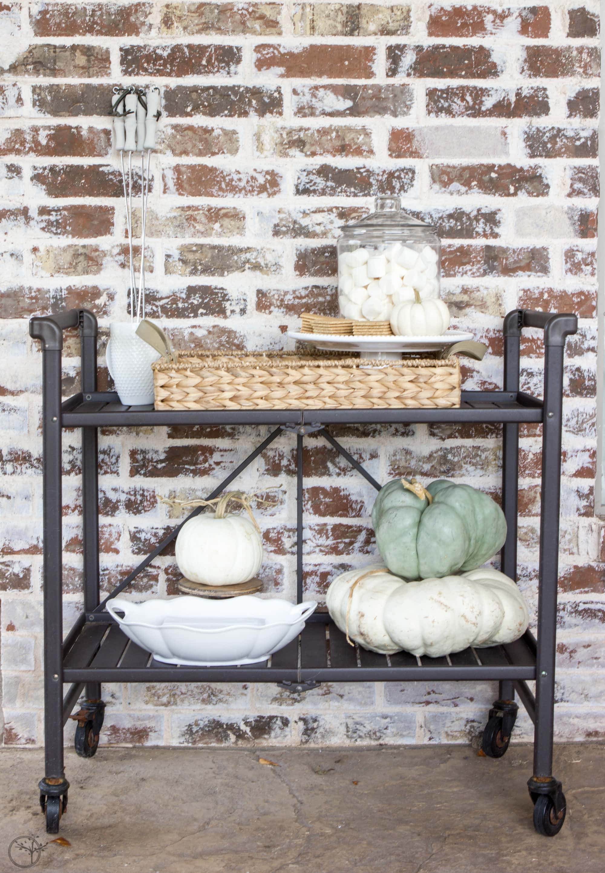 An outdoor s'mores bar cart is a perfectly unexpected way to gather loved ones together for the fall season. #s'mores #s'moresbarcart #outdoorentertainment #smoresrecipe