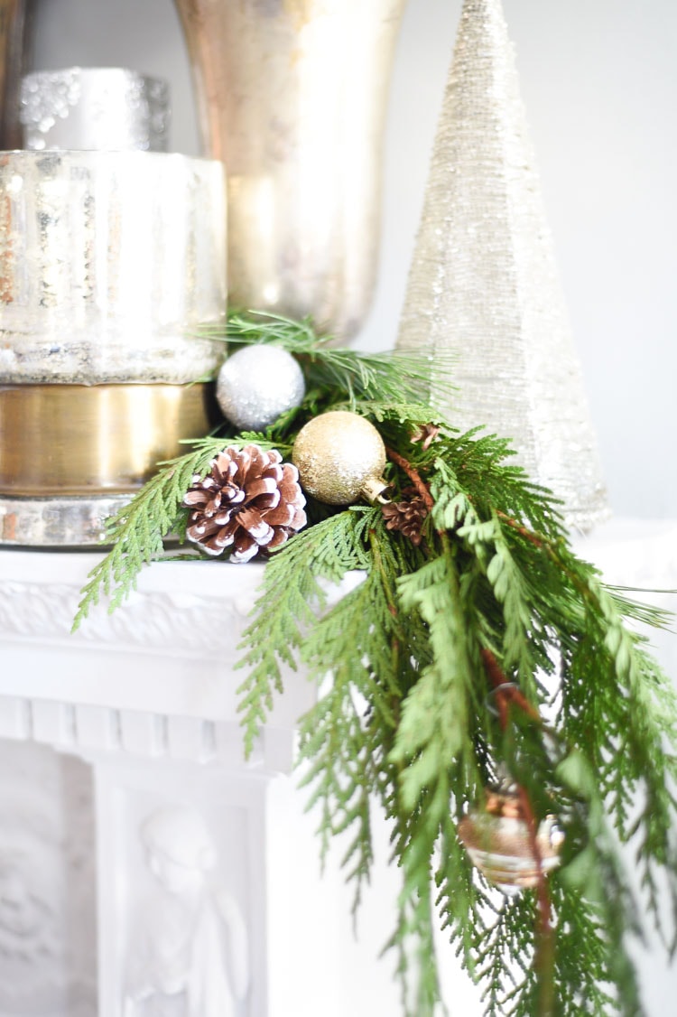 How to style your holiday table and mantel with vintage inspired holiday décor pieces, for more visit https://ablisfulnest.com #holidaydecor #holidaytablescape #holidaymantel