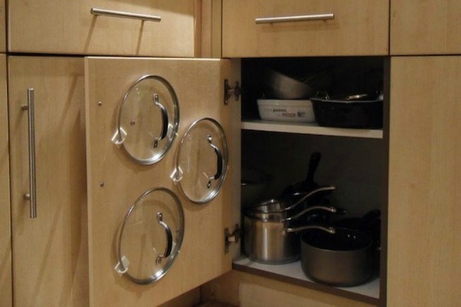 Don't lose all those lids to your pots and pans! Instructables, 15 Things to do with Command Hooks in your Home via A Blissful Nest