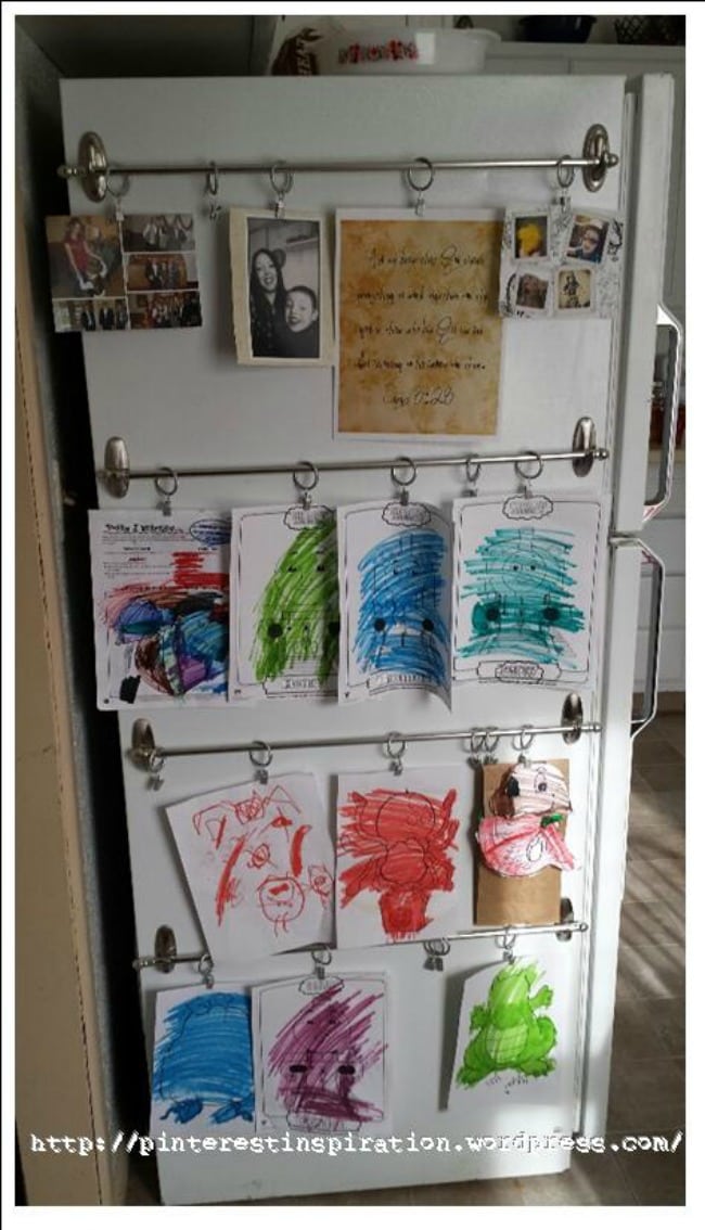 Hang rows of your kids' artwork with just two hooks and a rod. Pinterest Inspiration, 15 Things to do with Command Hooks in your Home 