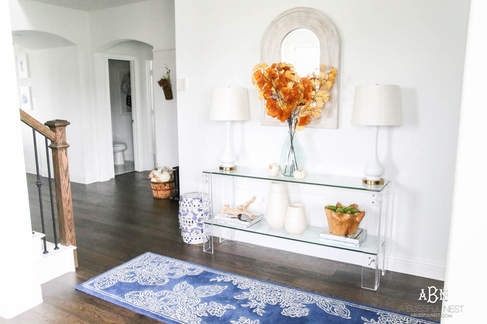 Gorgeous amber touches in this fall entry! Full sources on ablisfulnest.com #falldecor #fallentry #ABlissfulNest