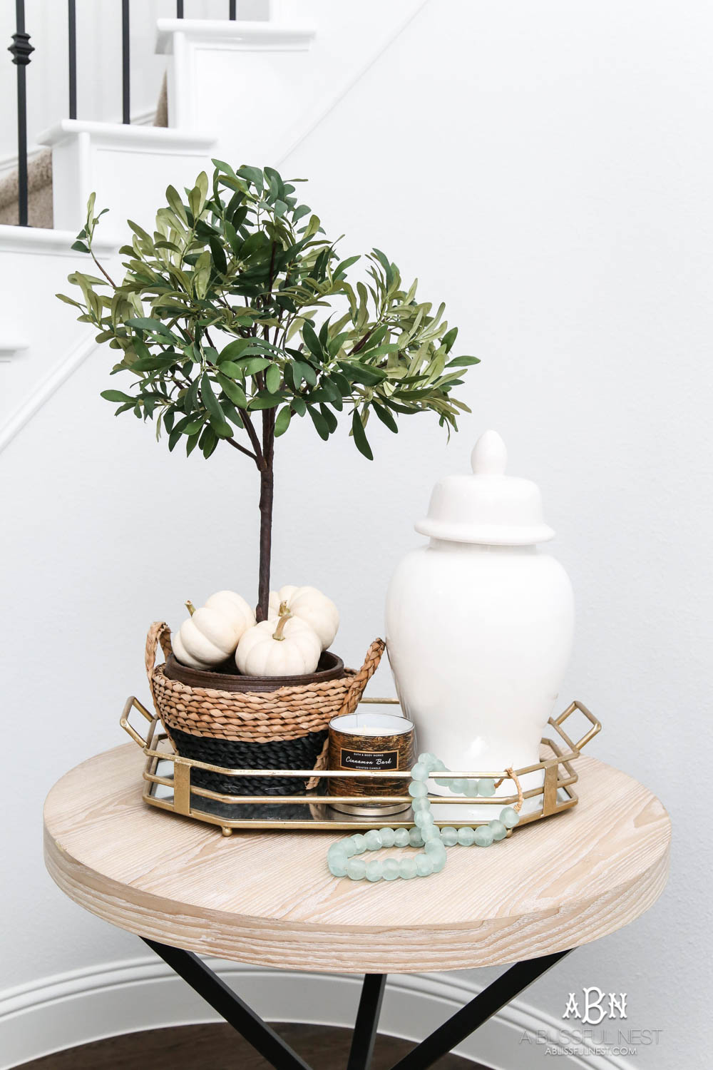 Gorgeous amber touches in this fall entry! Full sources on ablisfulnest.com #falldecor #fallentry #ABlissfulNest