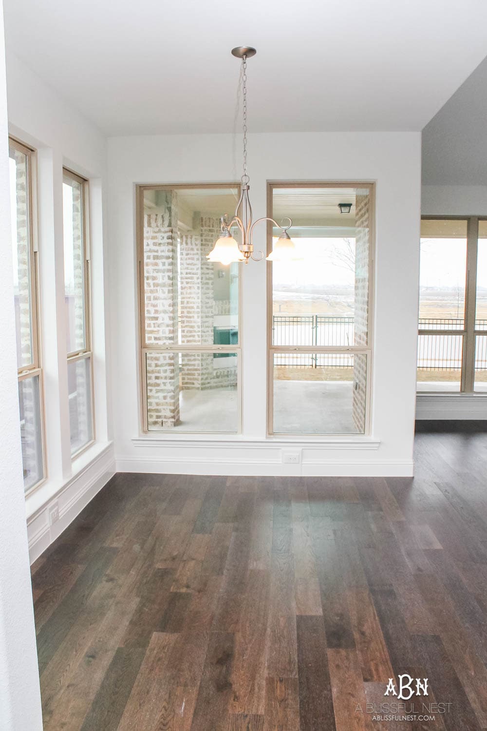 This is the simplest and easy way to install farmhouse barnwood on a ceiling! Just peel and stick these boards from Stikwood for a dramatic makeover to your plain ceiling or wall. More details on https://ablisfulnest.com #farmhousedecor #farmhouseproject #farmhousestyle #ad #stikwood