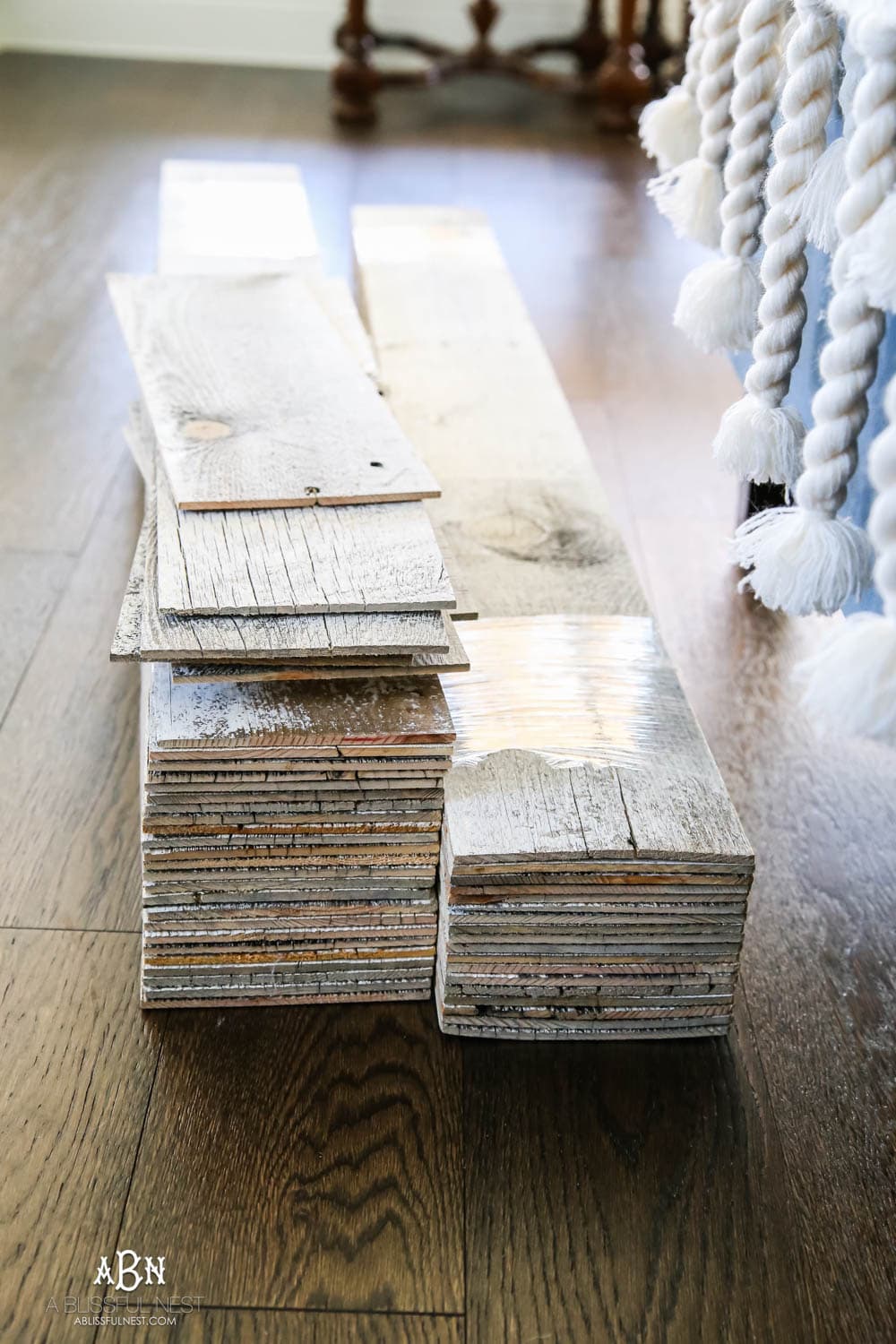 This is the simplest and easy way to install farmhouse barnwood on a ceiling! Just peel and stick these boards from Stikwood for a dramatic makeover to your plain ceiling or wall. More details on https://ablisfulnest.com #farmhousedecor #farmhouseproject #farmhousestyle #ad #stikwood