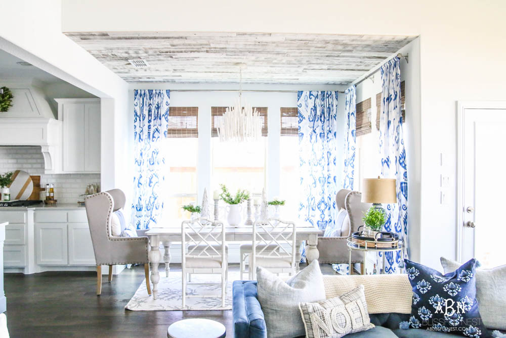 This is the simplest and easy way to install farmhouse barnwood on a ceiling! Just peel and stick these boards from Stikwood for a dramatic makeover to your plain ceiling or wall. More details on https://ablisfulnest.com #farmhousedecor #farmhouseproject #farmhousestyle #ad #stikwood