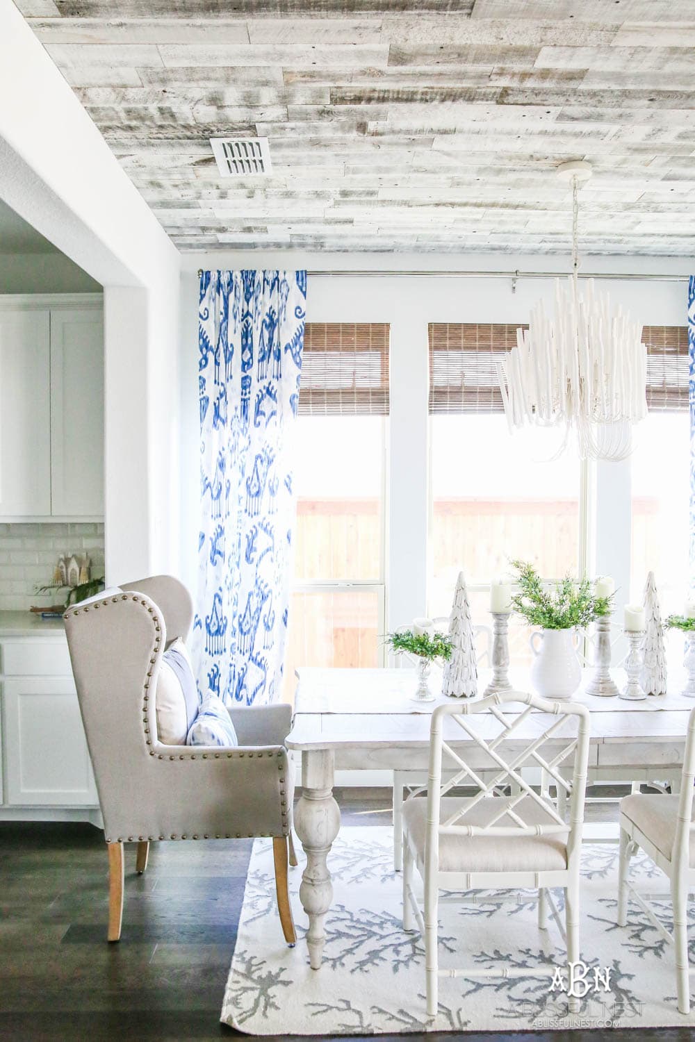 This is the simplest and easy way to install farmhouse barnwood on a ceiling! Just peel and stick these boards from Stikwood for a dramatic makeover to your plain ceiling or wall. More details on https://ablisfulnest.com #farmhousedecor #farmhouseproject #farmhousestyle #ad #stikwood