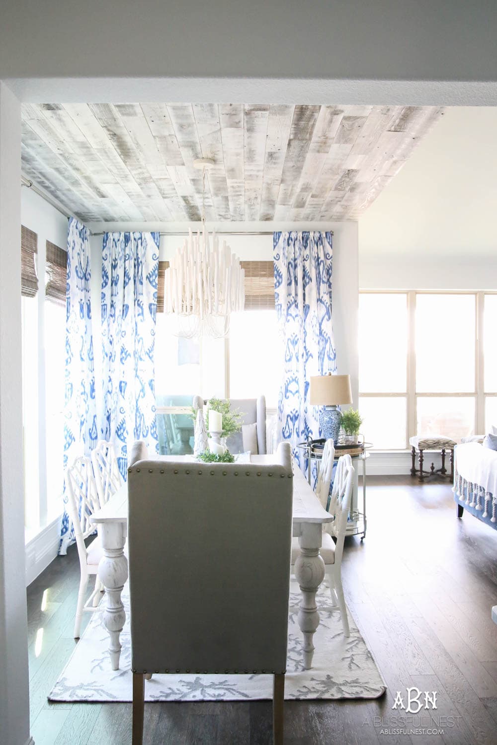 This is the simplest and easy way to install farmhouse barnwood on a ceiling! Just peel and stick these boards from Stikwood for a dramatic makeover to your plain ceiling or wall. More details on https://ablisfulnest.com #farmhousedecor #farmhouseproject #farmhousestyle #ad #stikwood