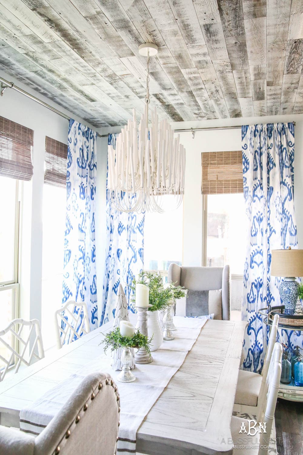 This is the simplest and easy way to install farmhouse barnwood on a ceiling! Just peel and stick these boards from Stikwood for a dramatic makeover to your plain ceiling or wall. More details on https://ablisfulnest.com #farmhousedecor #farmhouseproject #farmhousestyle #ad #stikwood