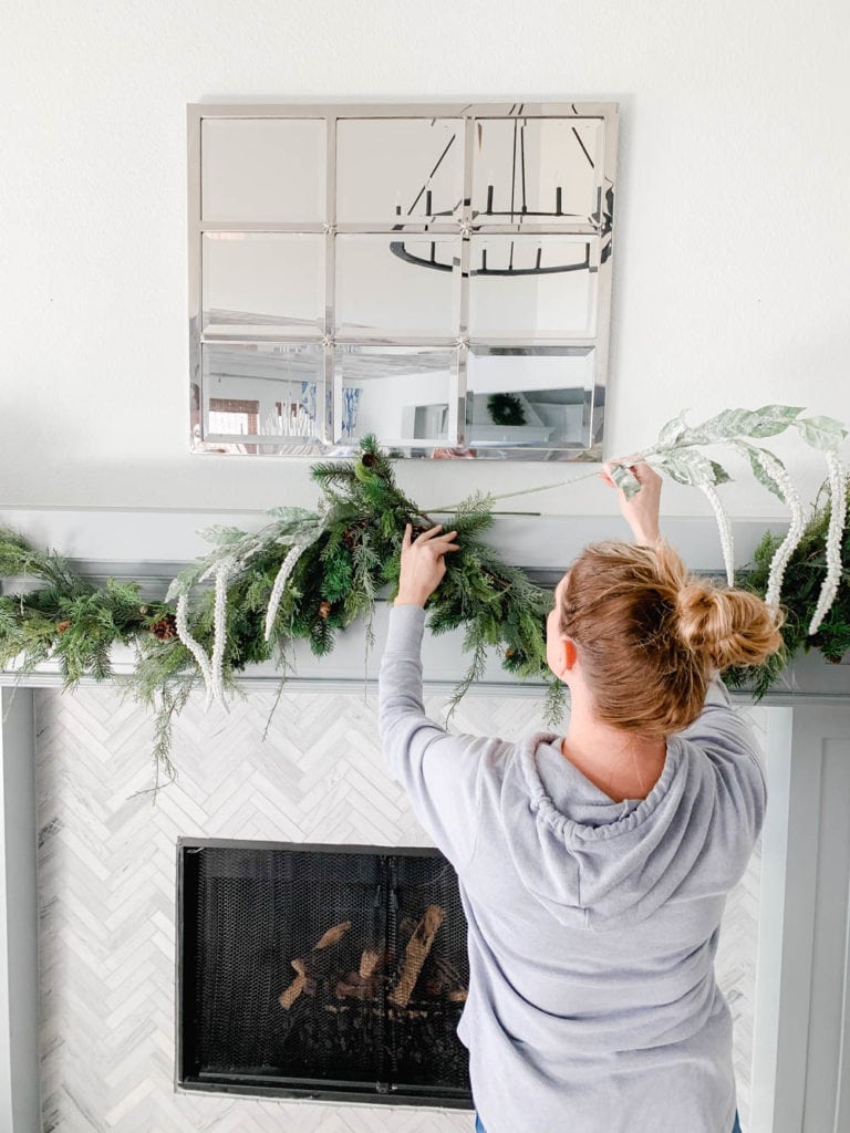 Get my tips to hang your garland for the holidays without damaging your walls! #ABlissfulNest #christmasdecor #christmasmantle