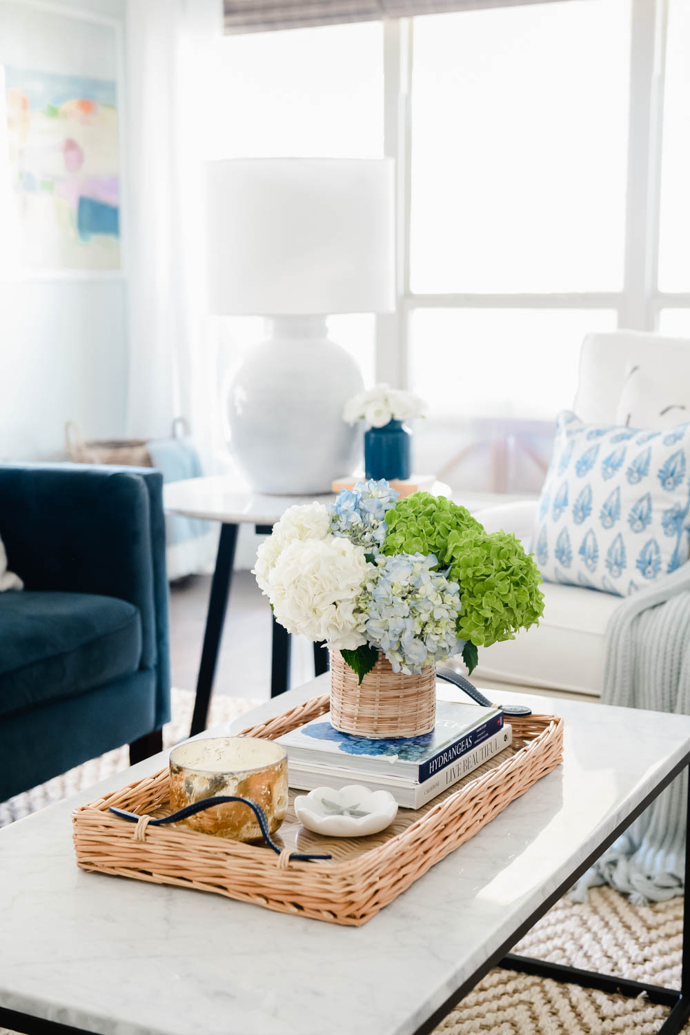 Summer fresh hues in this summer decor for a seasonal update. Fresh flowers, blue & white, green decor. #ABlissfulNest #summerdecor #summerhometour #livingroom