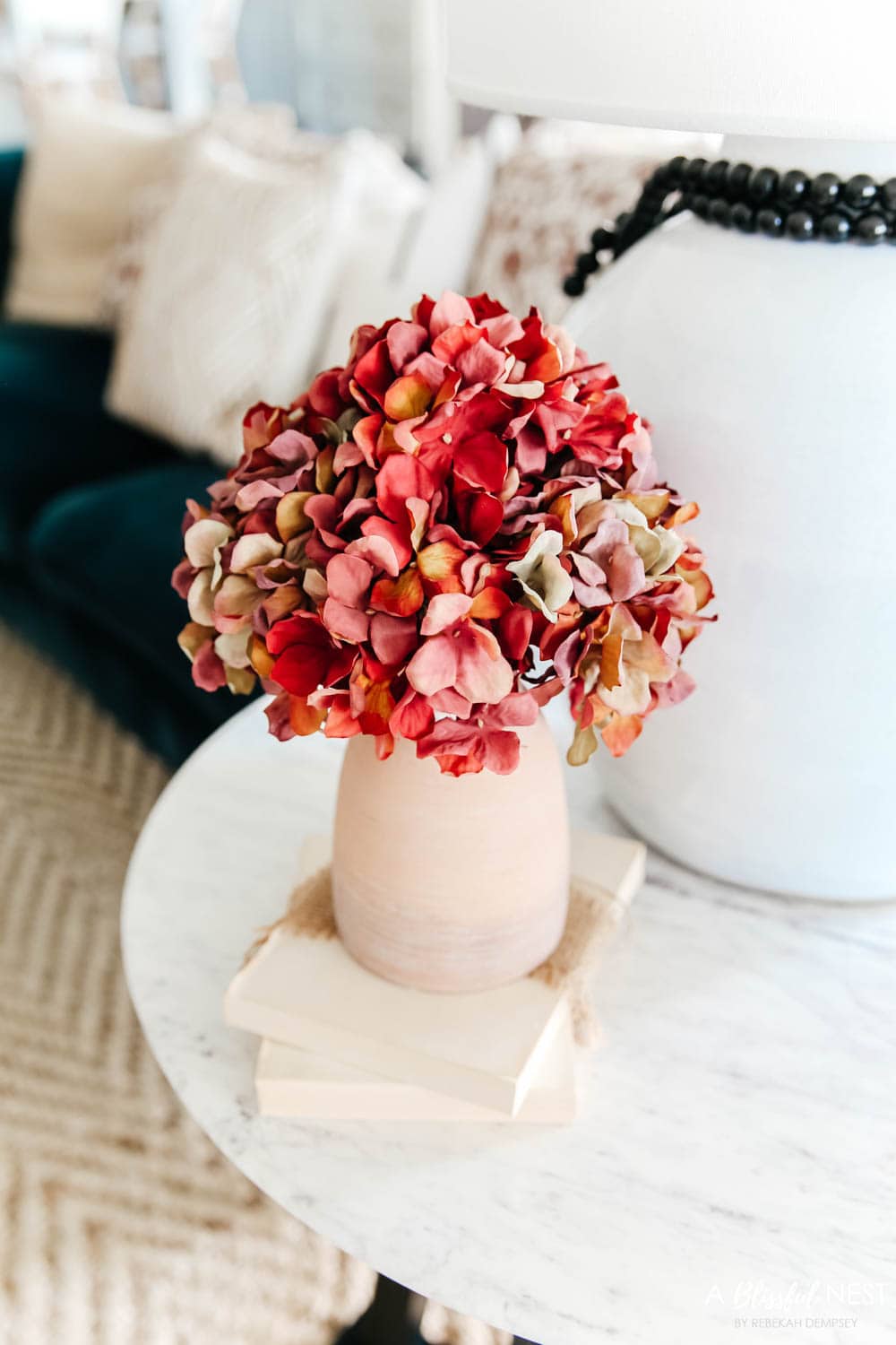 Add fall faux florals to the space. #ABlissfulNest #falldecor #fallideas