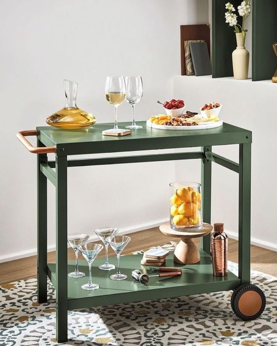 Moss green paint color on a bar cart