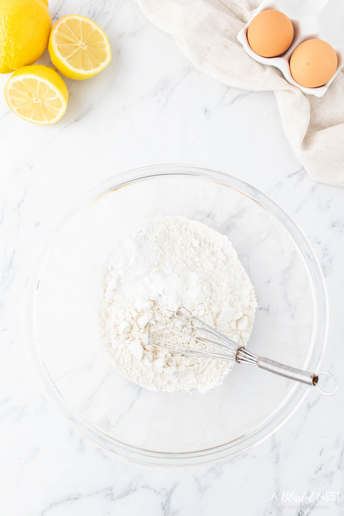 Dry ingredients mixed in a mixing bowl.