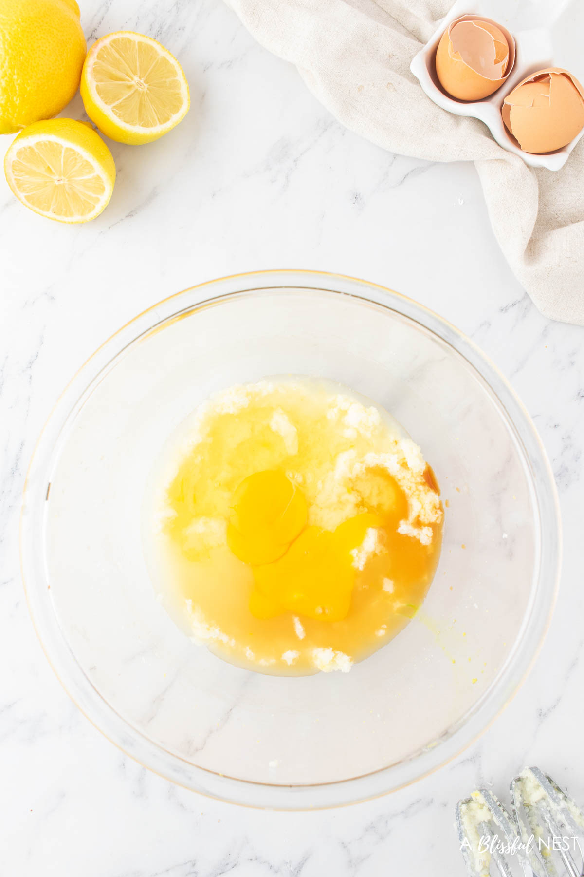 Wet ingredients mixed in a mixing bowl.