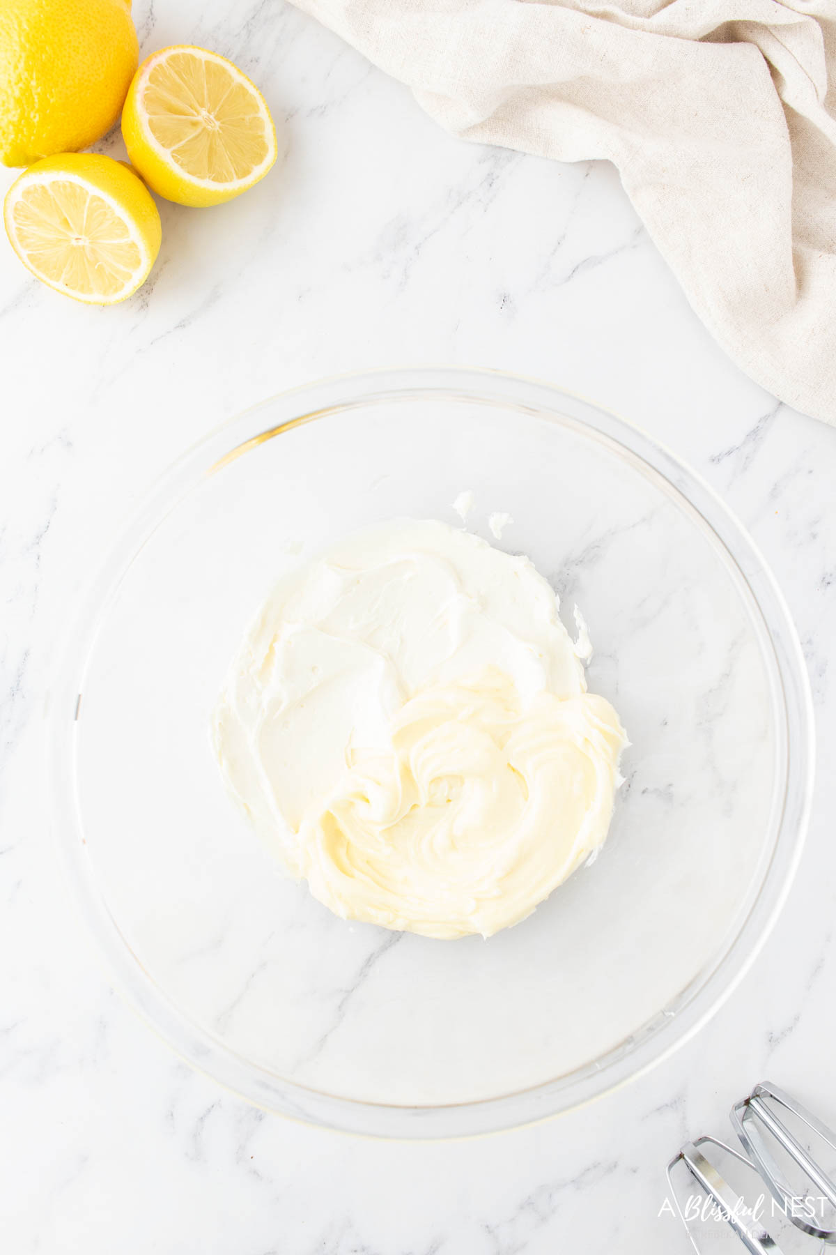 Cream cheese and buttery in a mixing bowl to make frosting. 