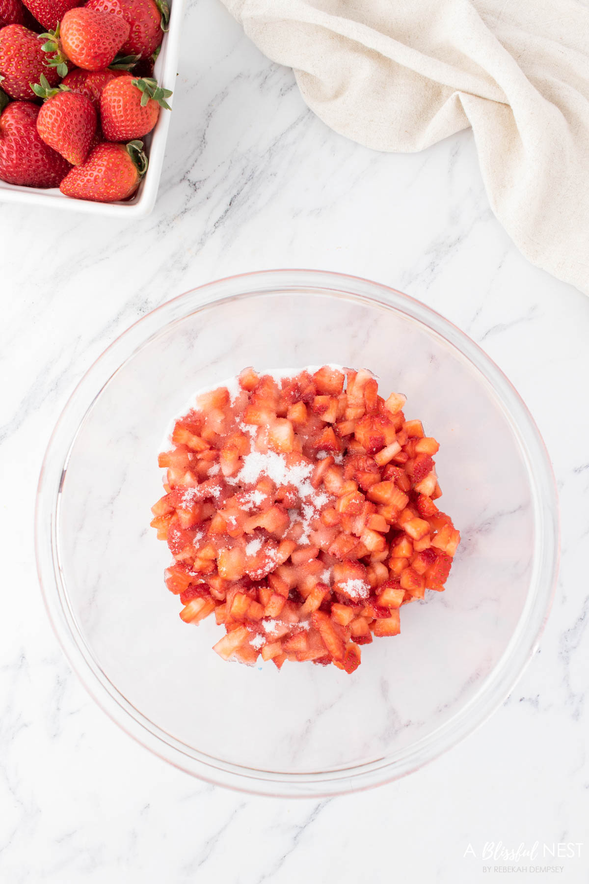 Chopped up strawberries mixed with sugar