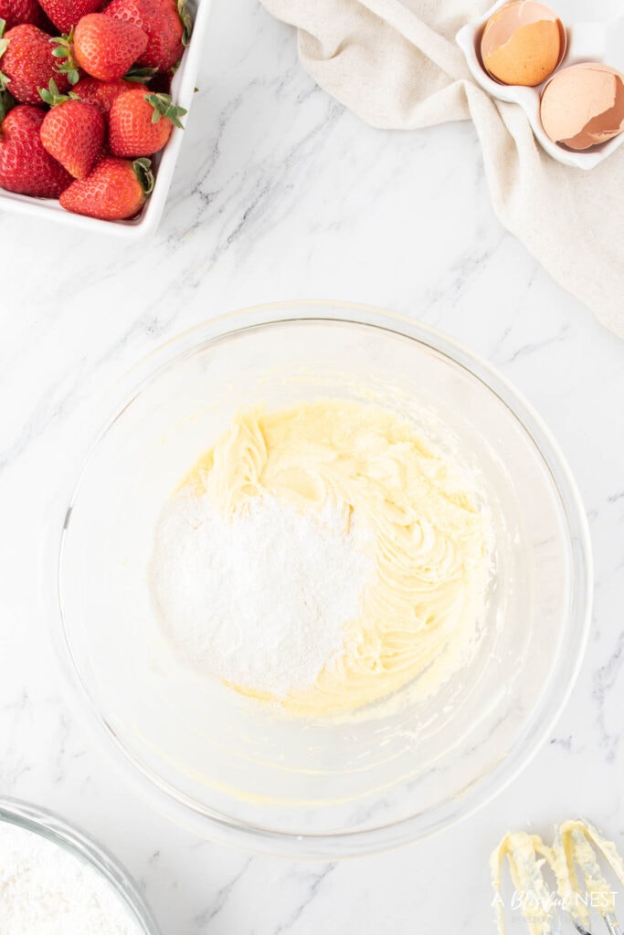 Dry ingredients added to wet in small batches