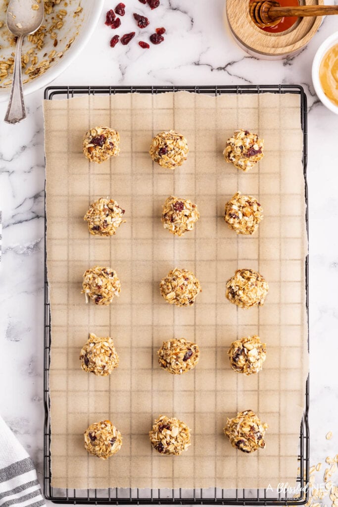 The mixture combined into 1" small balls and placed on a parchment paper lined tray.