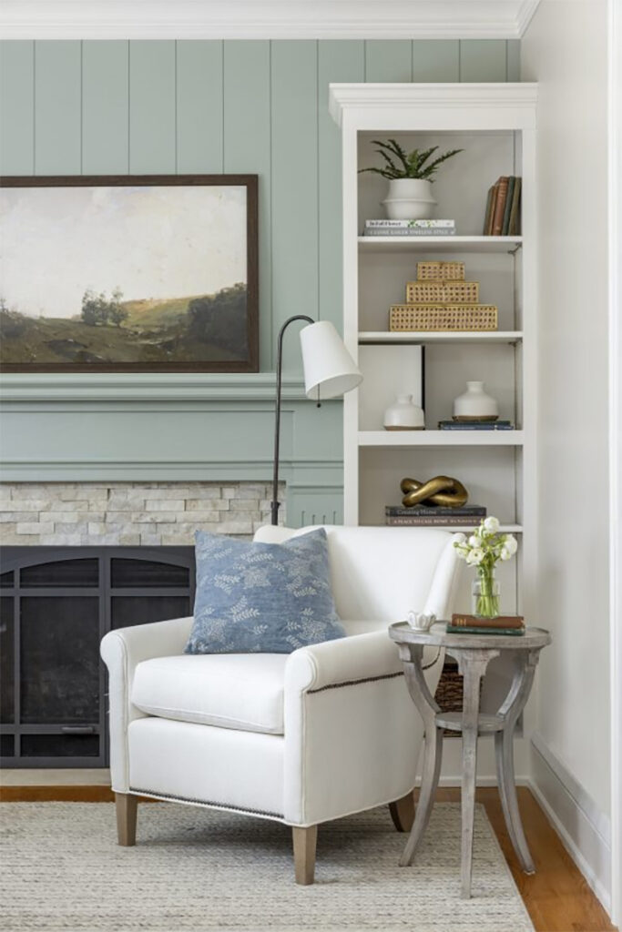 This living room designed by Bria Hammel Design has the most stunning painted shiplap and built-in shelving is so stunning! #ABlissfulNest