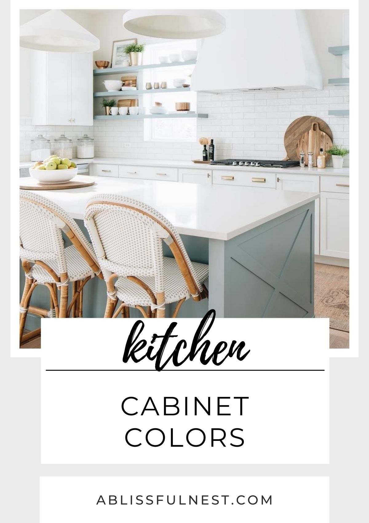 Soft sea foam green kitchen island with white kitchen cabinetry, Serena & Lily barstools, floating shelves