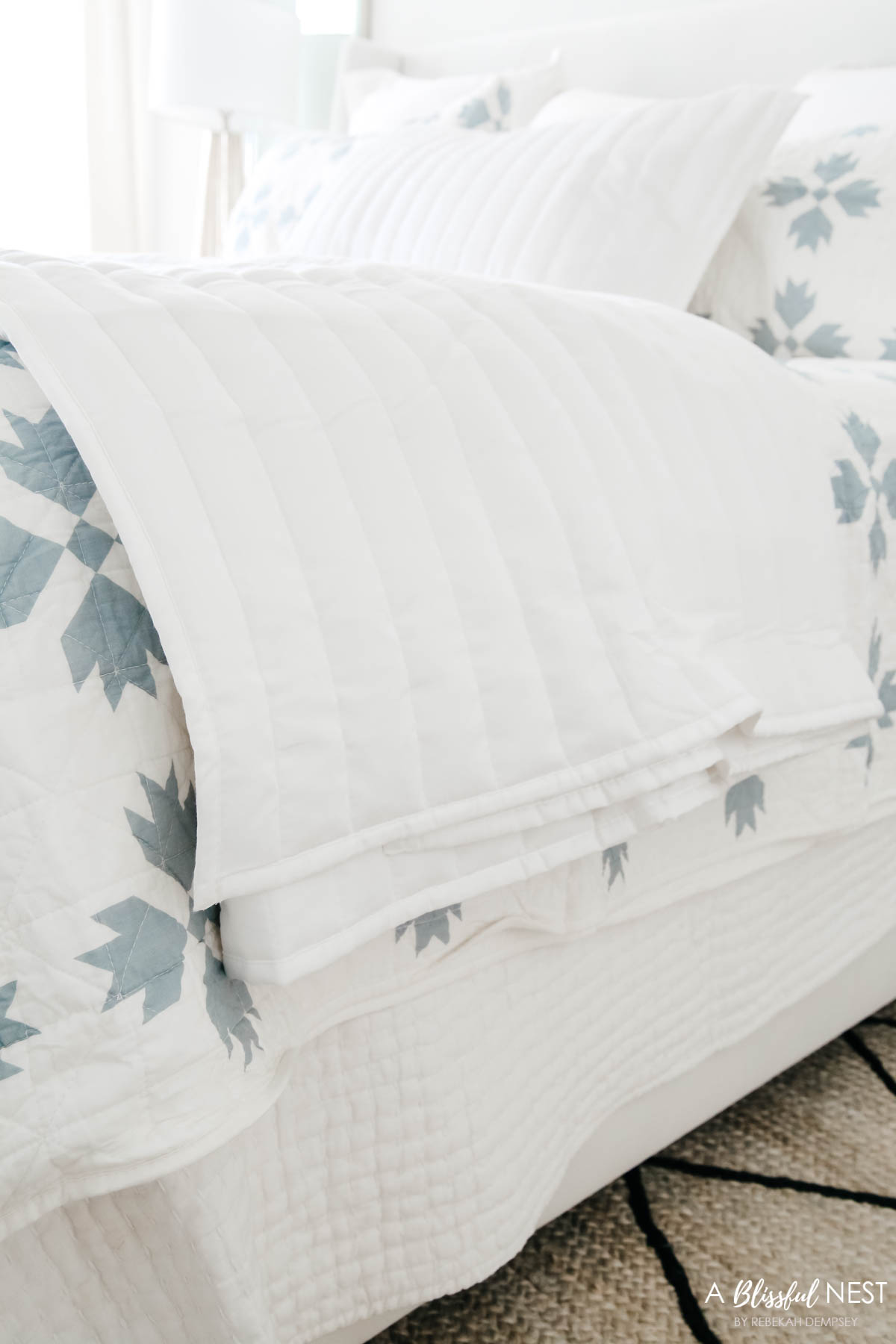 layered blankets on a bed. 