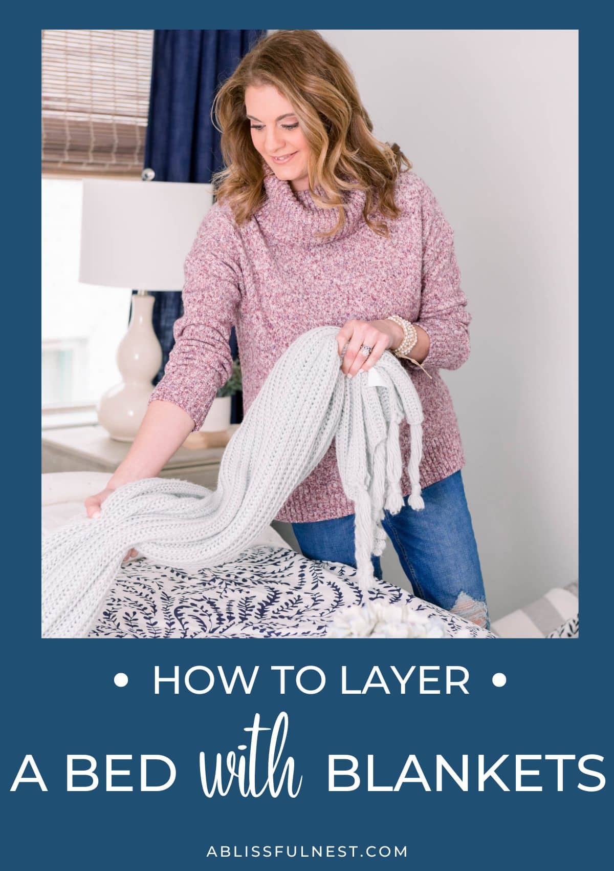 casually drapping a throw blanket at the end of a bed