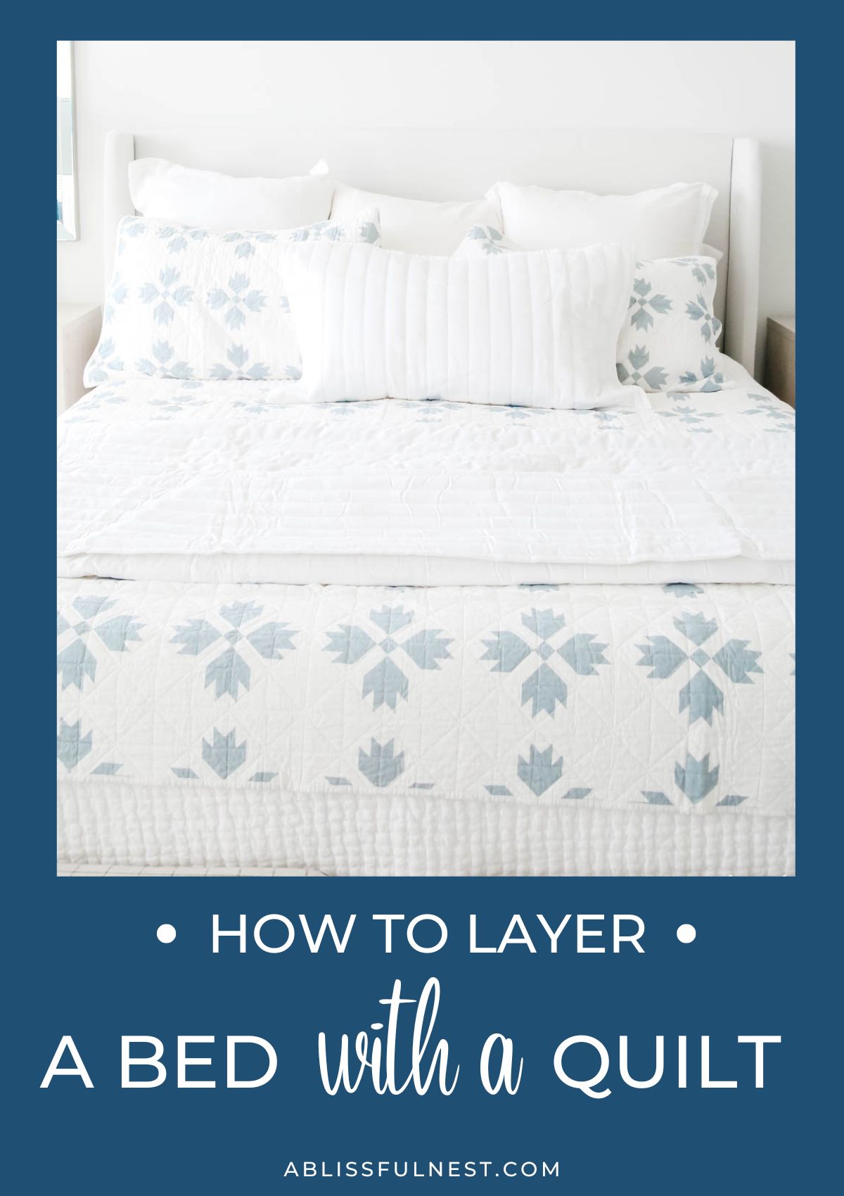 sea green quilt on white bed.
