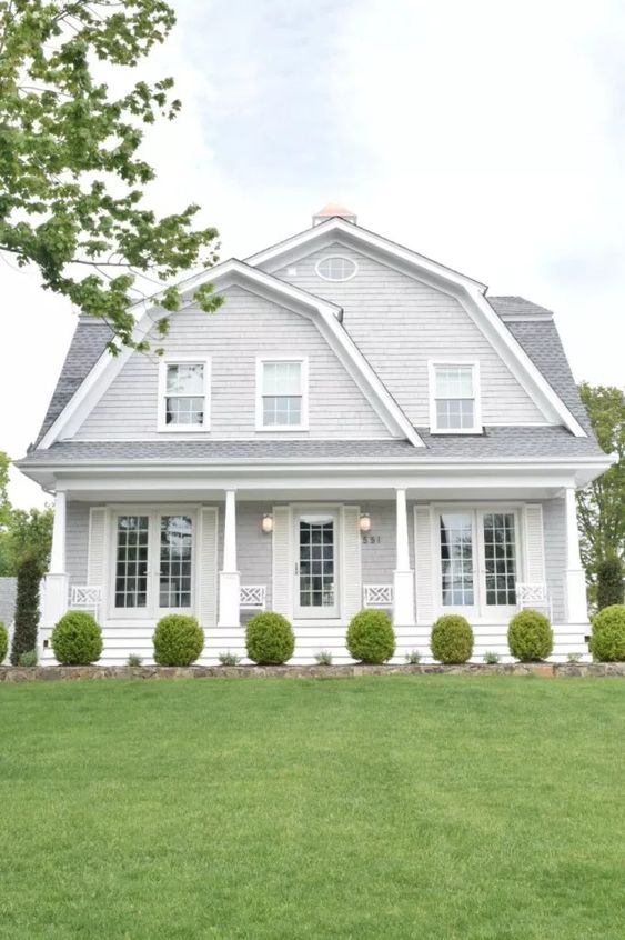 grey and white cape code style home