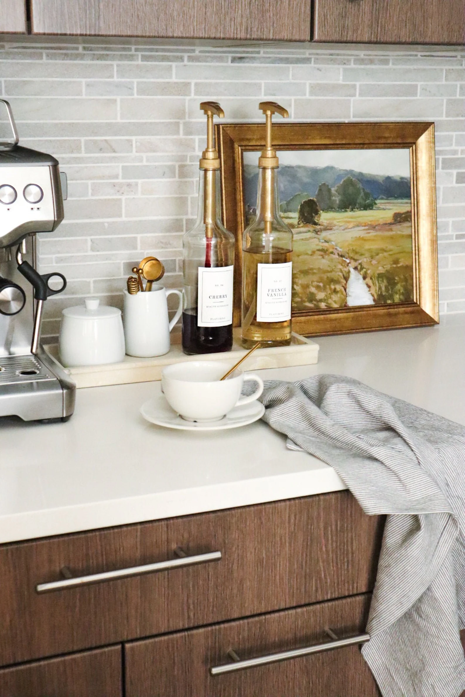 coffee station with coffee syrups on tray