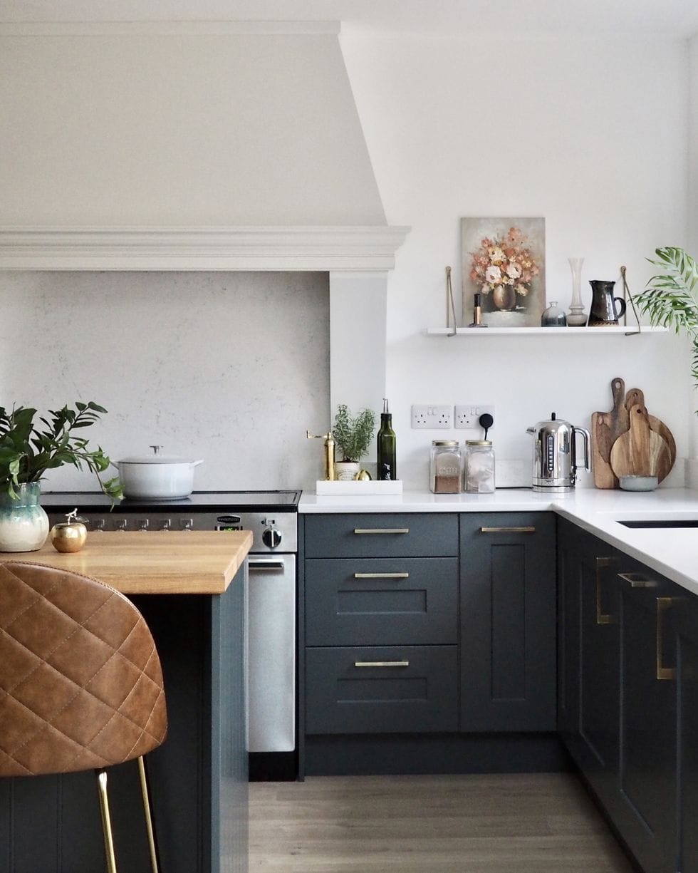 black kitchen cabinets with white countertop