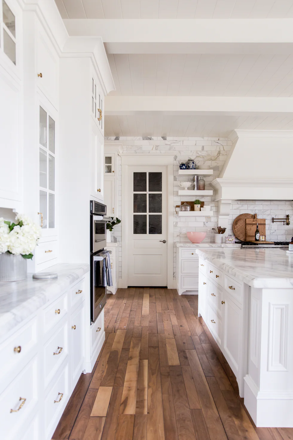white kitchen cabinets with gold hardware