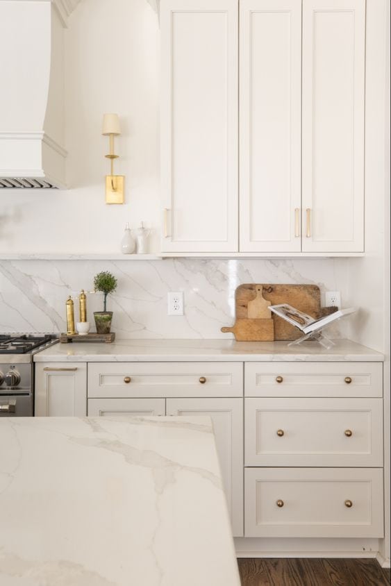 cream kitchen cabinets with gold hardware