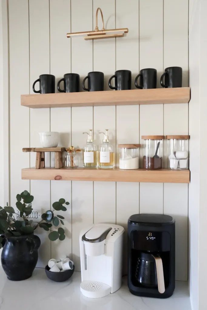black coffee mugs, syrupy pumps, canisters for coffee beans