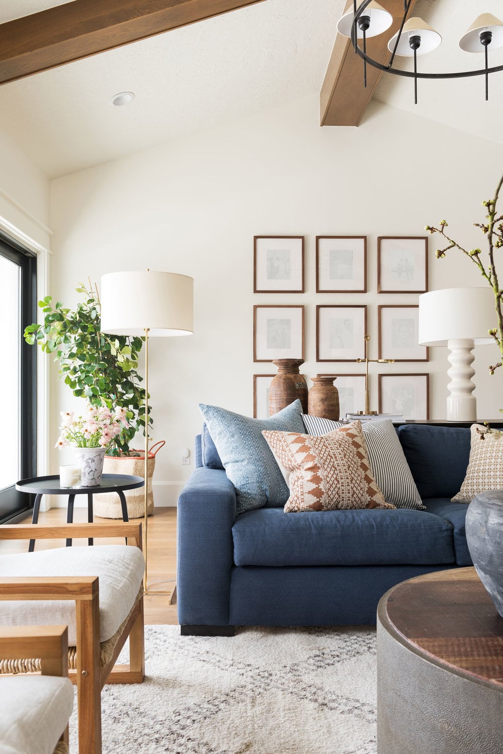 navy blue sofa in a neutral living room