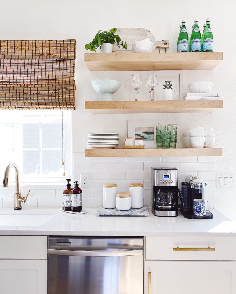 coffee station set up next to sink area in a kitchen