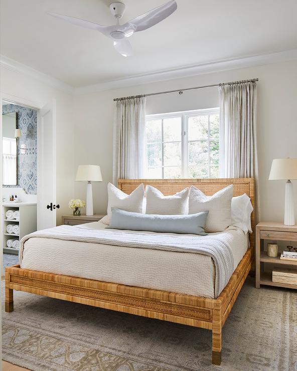 Rattan bed frame with white bedding