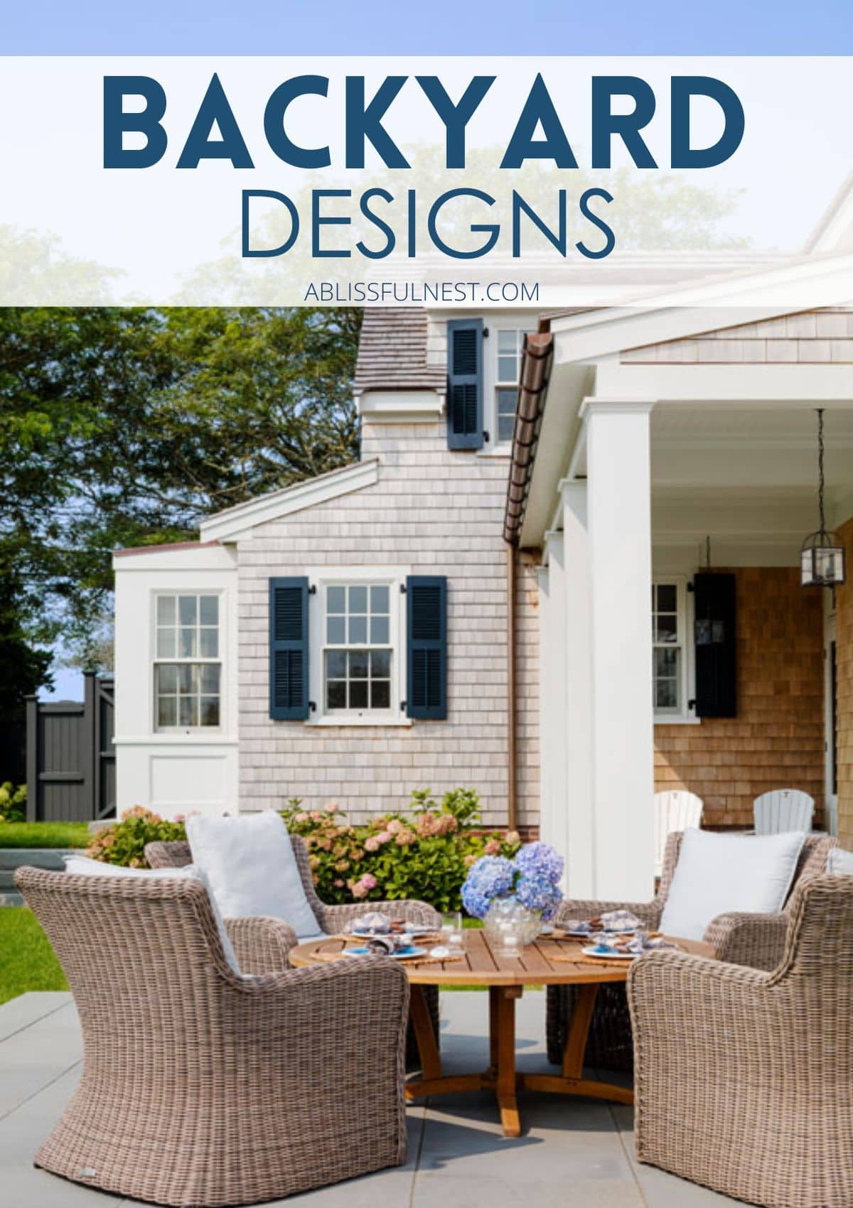 Rattan chairs around a teak outdoor table on a patio